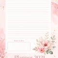 Un planner floral ouvert sur une table, avec des stylos colorés à côté pour une organisation élégante.